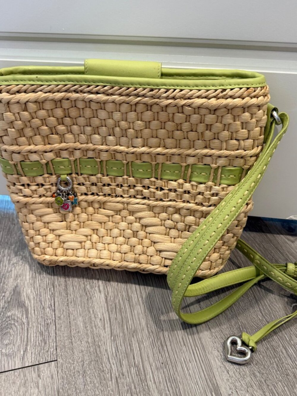 Brighton Straw Woven Crossbody Bag with Green Accents and Charms